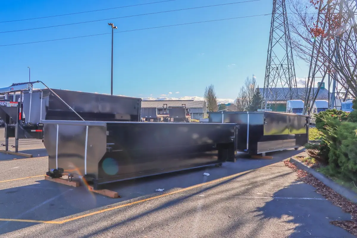 Roll-off dumpster ready for waste disposal at job site for 2 Yard Dumpster Rental in Highland